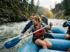 Best Raft Paddle Brand Why $50 Beats the Guide Stick Raft crew paddling with Carlisle T-grip paddles on a gray-green Western river