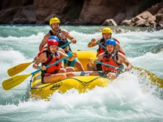 An Expert Analysis of Critical Rafting Paddling Mistakes A full-body action shot of a fit group of four rafters in their late 20s navigating a challenging whitewater rapid.