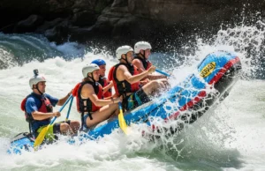 High-Side Command in Rafting: A Tactical Guide A full crew of rafters in a whitewater raft executing a high-side command, leaning hard onto the high side of the boat as it tilts in a powerful rapid.