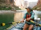 Wood vs Carbon Rafting Oars What Most Rafters Get Wrong Rafter rowing an oar rig with Sawyer composite oars on a calm desert river reach