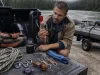 4 Carabiners or Your Raft Pin Kit Is Just Parts Raft pin kit components laid out on a tailgate with locking carabiners counted before a river trip