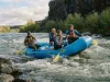 Why Self-Bailing Beats Bucket Boats Until It Doesn’t Self-bailing raft floating high through a wave train with water draining off the floor