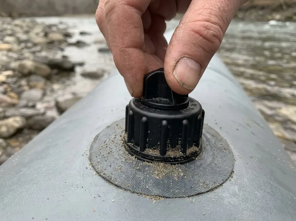 Close-up of a Leafield C7 inflation valve on a raft tube during valve identification