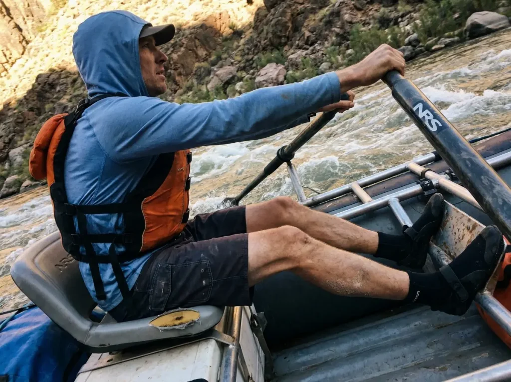 Rower driving with braced legs and pivoting torso, the kinetic chain behind oar stroke power