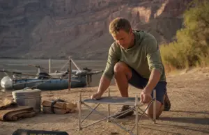 Best Fire Pans for River Trips That Pass a Ranger Check Lightweight fire pan set up on a Grand Canyon sand beach at camp on a multi-day river trip