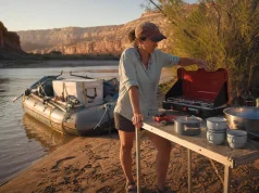 Best River Camping and Kitchen Gear Your Permit Requires River camp kitchen coming together on a Green River sandbar in Desolation Canyon at dusk