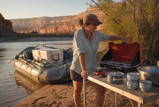 Best River Camping and Kitchen Gear Your Permit Requires River camp kitchen coming together on a Green River sandbar in Desolation Canyon at dusk